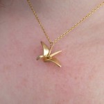 Wearing my gold Crane Necklace
