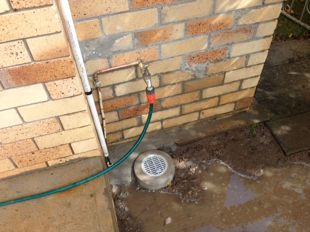 Overflow relief gulley outside of home
