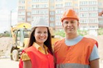 Portrait of two builders