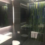 bathroom-at-capri-tiled-wall