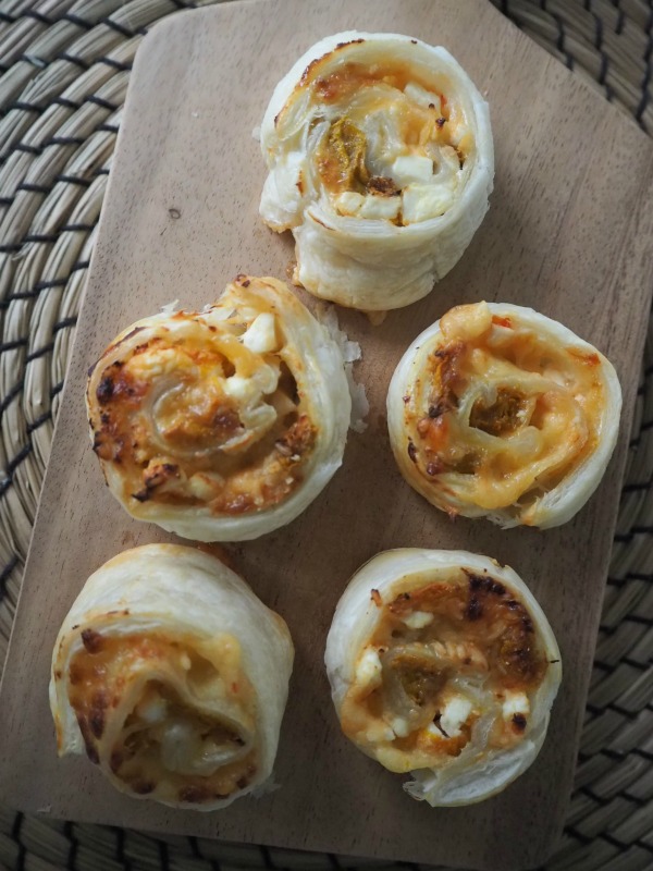 tradie's lunchbox pumpkin and feta pinwheels with sweet chilli sauce and sour cream