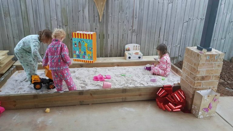 Removable Timber Sandbox With a Deck Lid