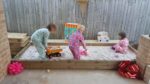 playing in sandpit