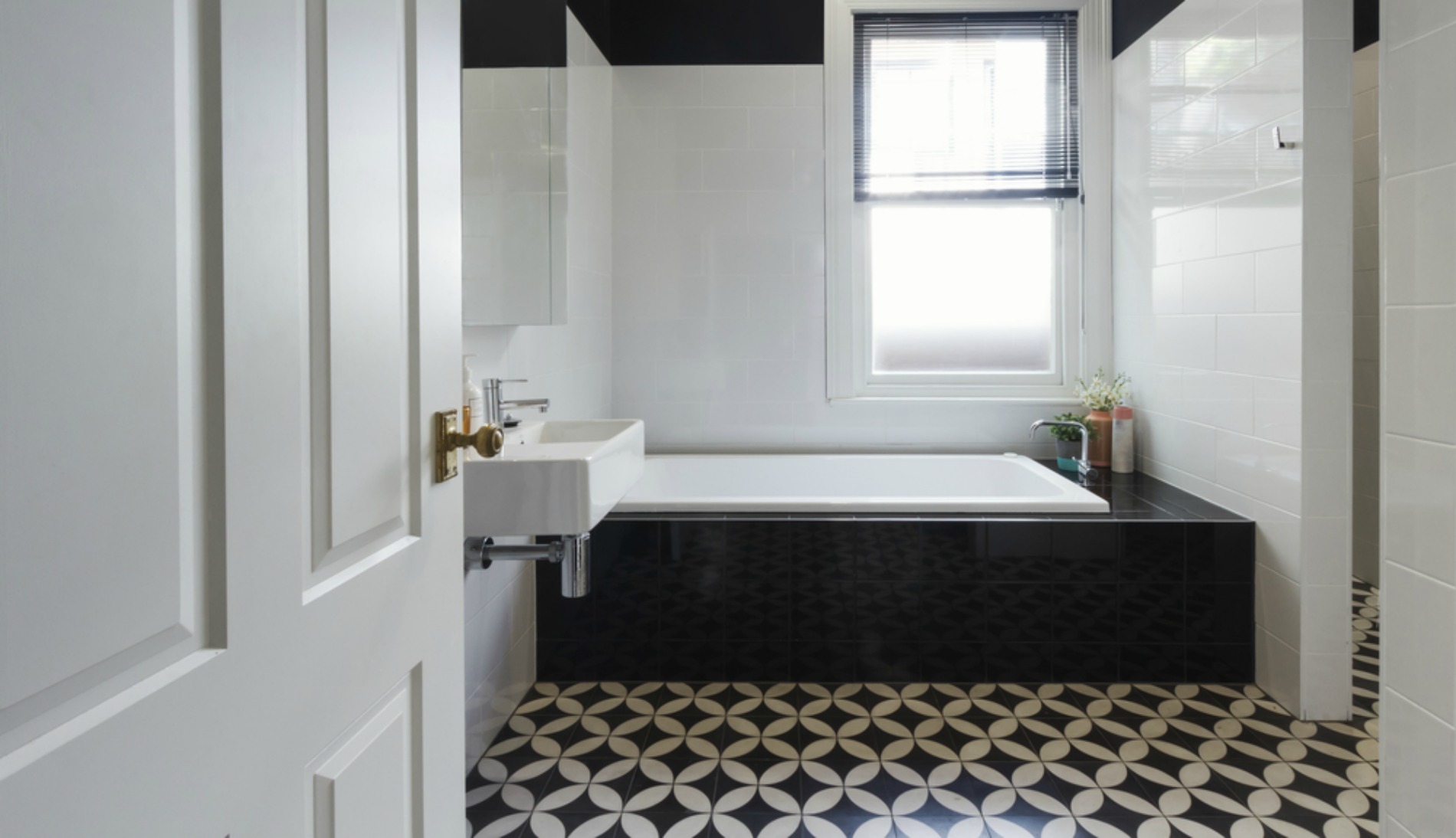 Bathrooms With Black And White Patterned Floor Tiles
