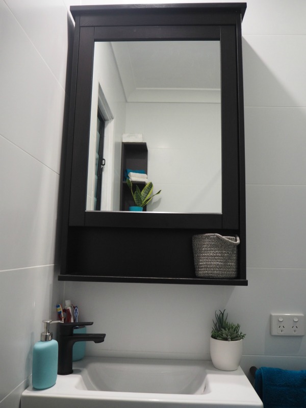 mirror storage in small bathroom