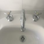 old tap buttons basin