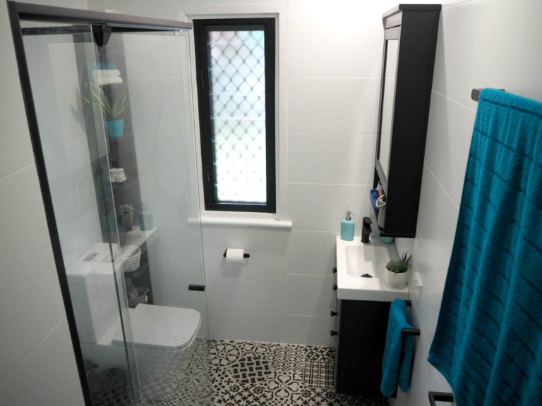 Before and After Reveal of a Small Bathroom Renovation