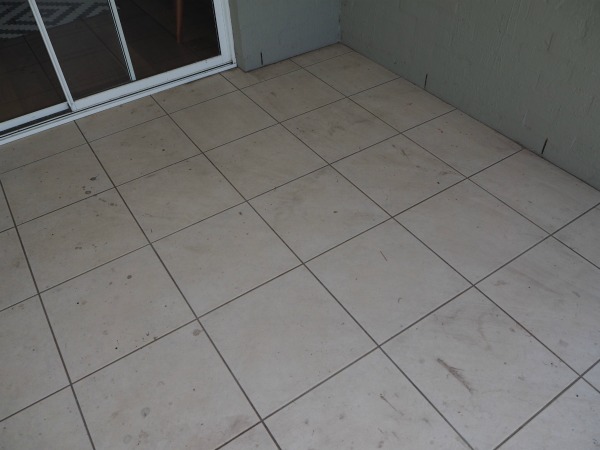 Aflresco floor before Ryobi Pressure washer