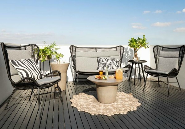 Affordable outdoor furniture set in black modern setting