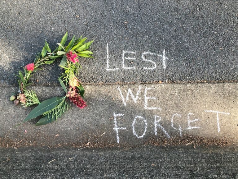 Australian Native Floral Wreath for Anzac Day on footpath bitumen