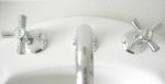 changint tap buttons in basin