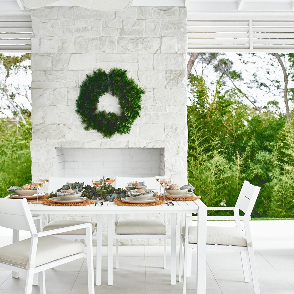 Christmas Wreath hung in outdoor area
