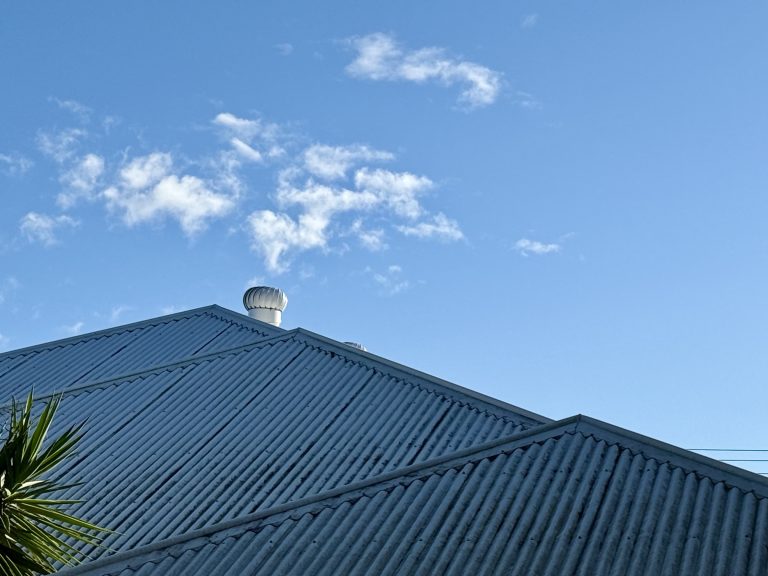 Passive cooling using roof whirlybirds to promote air flow through the home